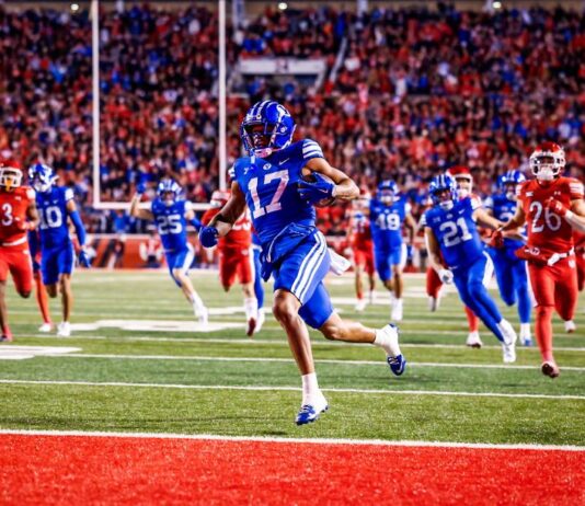 Predicting The Big 12 College Football Playoff Rankings (Week 12) BYU's Keelan Marion returns a kickoff for a touchdown against Utah. BYU went on to win 22-21.