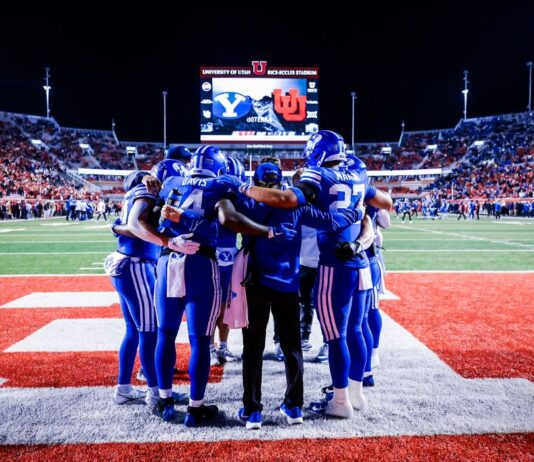 2024 Big 12 Power Rankings (Week 12): BYU No. 1, Colorado, ASU Rise — Iowa State Falls BYU players huddle before the start of the game against Utah.